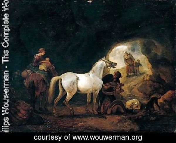 Philips Wouwerman - A man staddling a white horse in cave