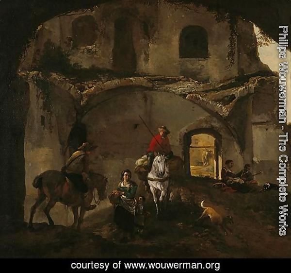 An Italianate Landscape With Two Riders And Other Figures Beneath Ruined Buildings