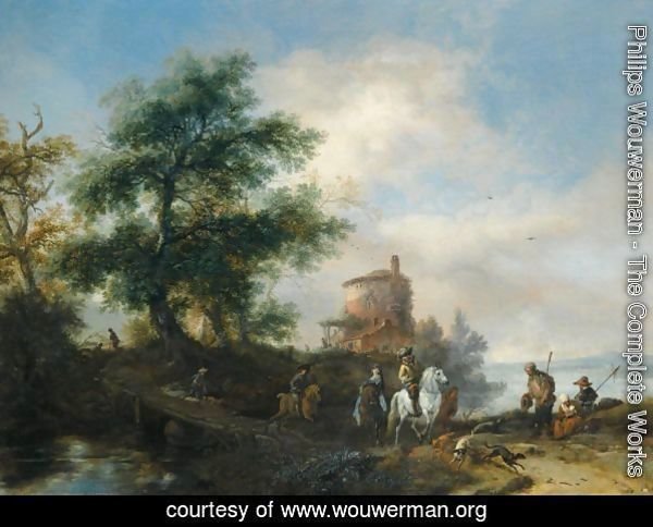 A River Landscape With A Gentleman And Lady Riding To The Chase, With A Pilgrim Asking For Alms In The Foreground, Other Members Of The Hunting Party Crossing A Wooden Bridge, A Tower Beyond